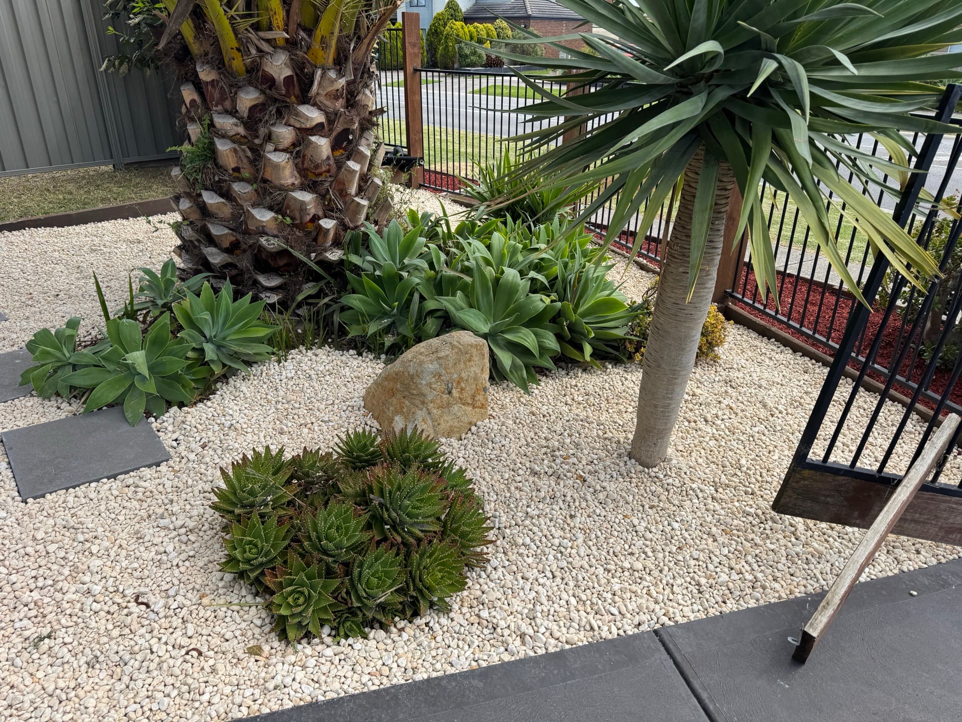 Neat garden maintenance finish by Laser Cut Mowing